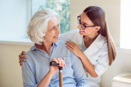 home health aide with elderly woman